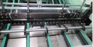 Spine pressing unit Spine pressing unit
